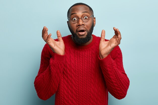 african american man wearing red sweater