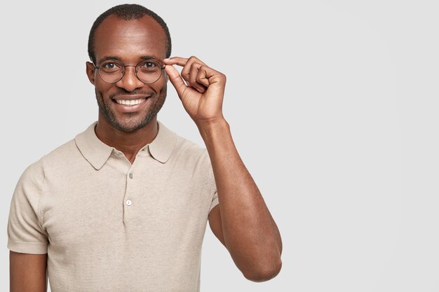 African-American man wearing round glasses