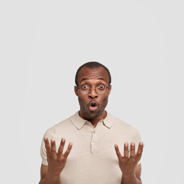 African-American man wearing round glasses