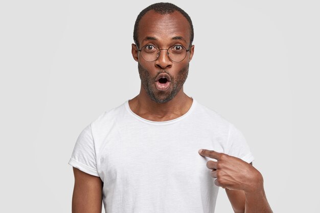 African-American man wearing round glasses