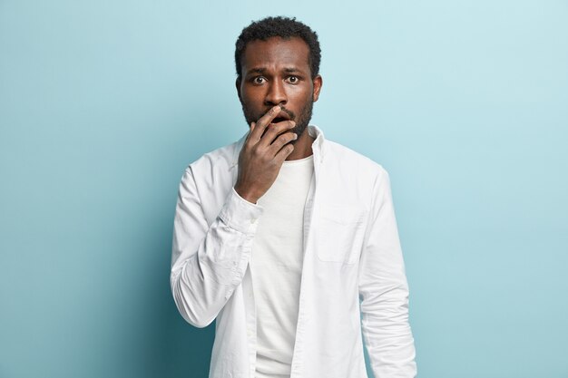 African American man wearing white shirt