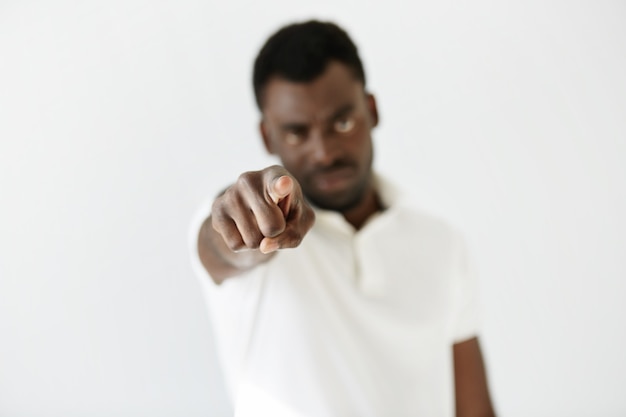 African-American man wearing white T-shirt