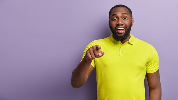 African American man wearing yellow T-shirt