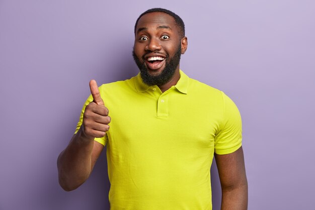 African American man wearing yellow T-shirt