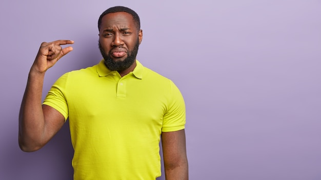 African american man wearing yellow t-shirt