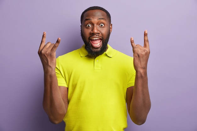 African American man wearing yellow T-shirt