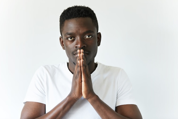 African American man in white T-shirt