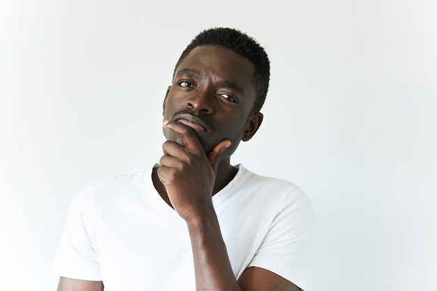 African American man in white T-shirt