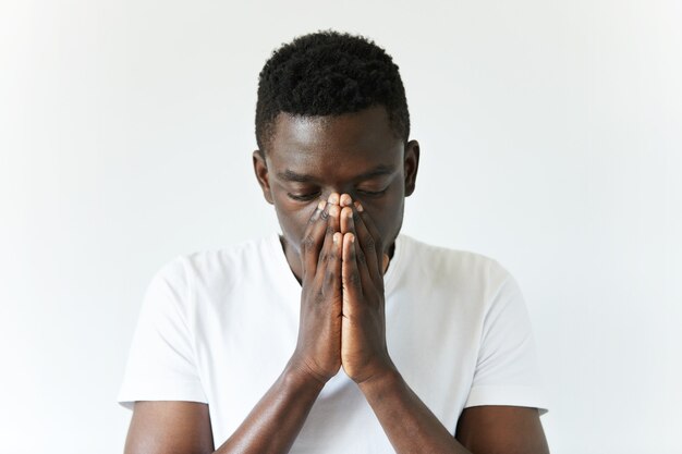 African American man in white T-shirt