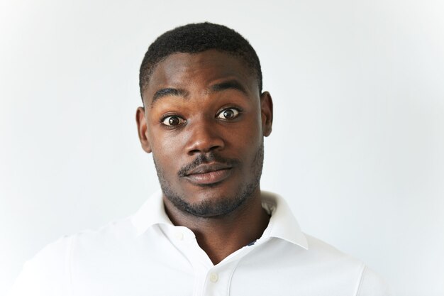 African American man in white T-shirt