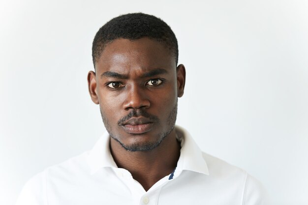 African American man in white T-shirt