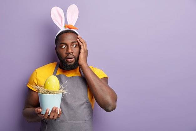 African American man with bunny ears