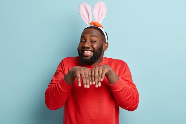 African American man with Easter bunny ears