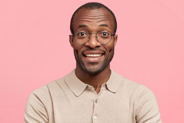 African-American man with round eyeglasses