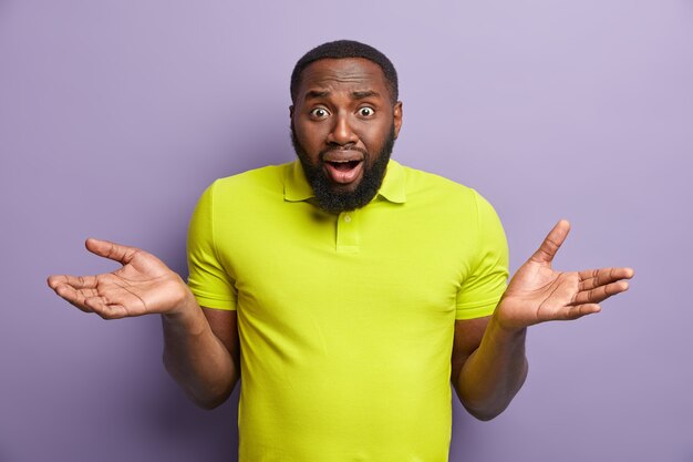 African American man in yellow T-shirt