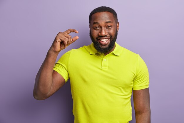 African American man in yellow T-shirt