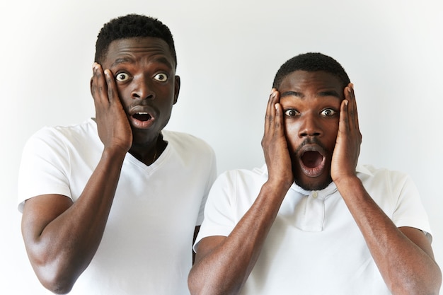 African American men in white T-shirts