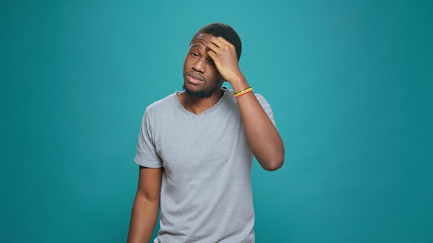 African american person expressing rejection and refusal, doing no sign and disapproval gesture. Young man feeling displeased and disappointed about showing negative symbol and denial.