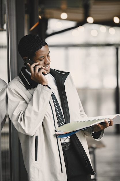 Free photo african american preparing for a business meeting