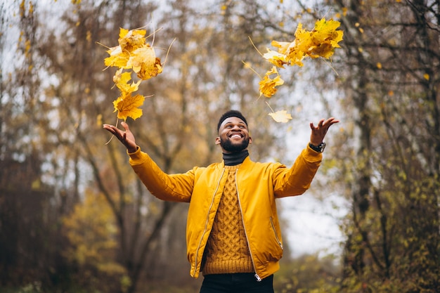 African american student walking in the park