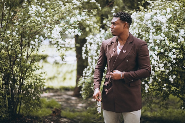 African american student walking in the park