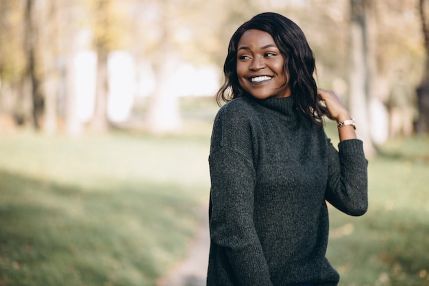 African american woman happy outside in park