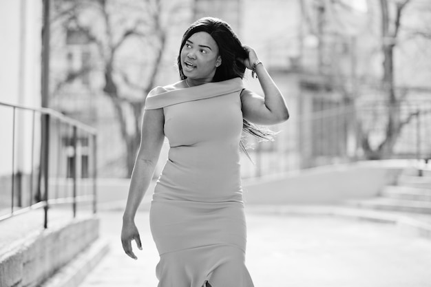 African american woman model xxl in orange dress