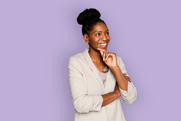 African-American woman smiling with hand on the chin