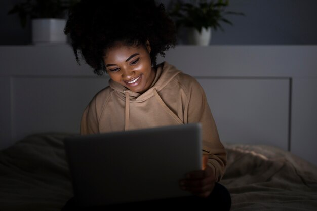 African american woman watching streaming service 