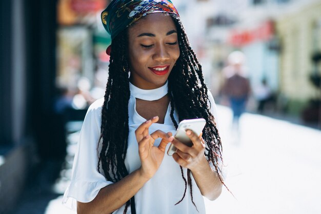 African american woman with phone