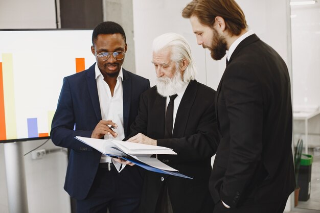 African man in a black suit.