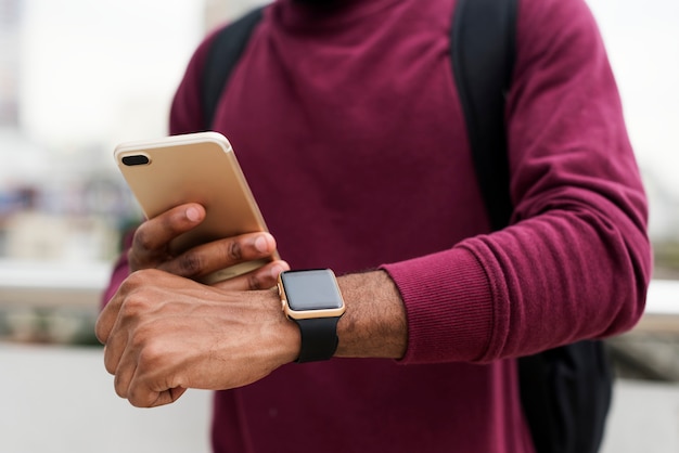 Free photo african man using mobile phone