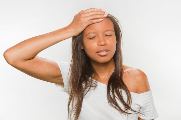 African teenage girl suffering from headache