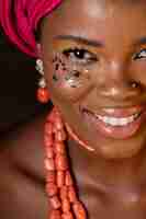 Free photo african woman wearing traditional accessories close-up