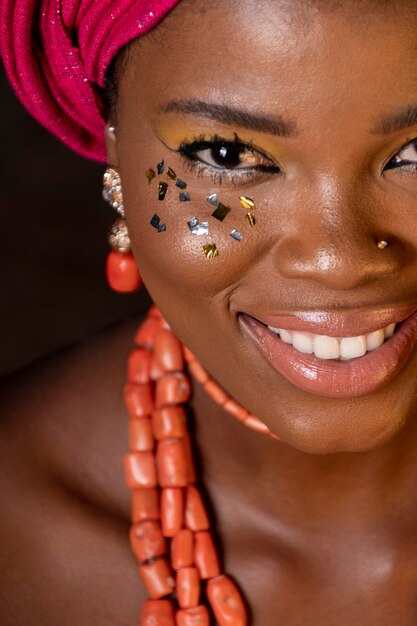 African woman wearing traditional accessories close-up