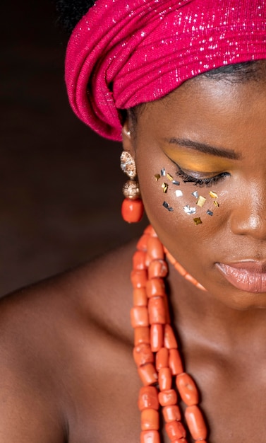 African woman wearing traditional accessories