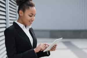 Free photo afro american business woman medium shot