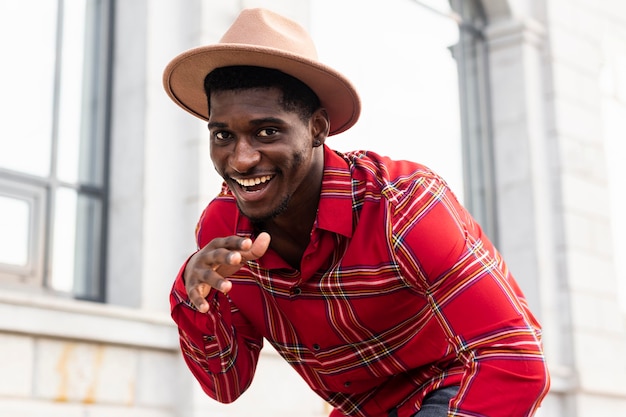 Free photo afro american man doing a dance move