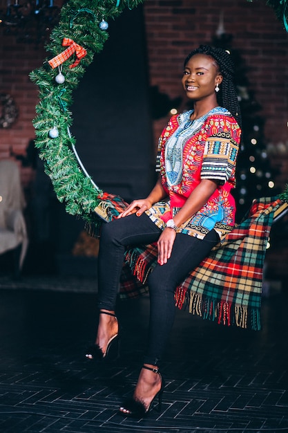 Afro american woman model in studio on christmas