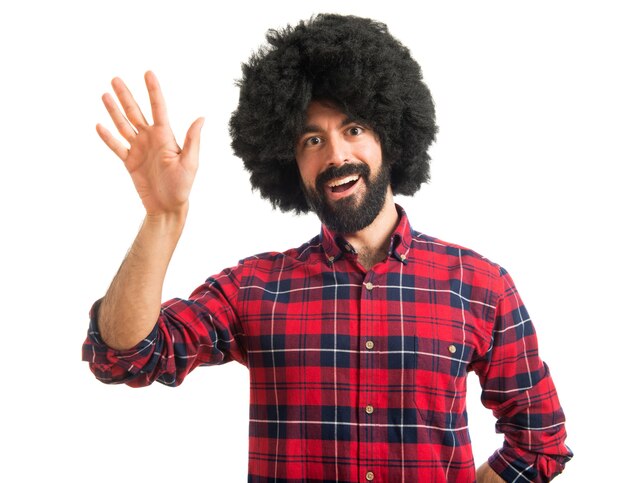 Afro man saluting