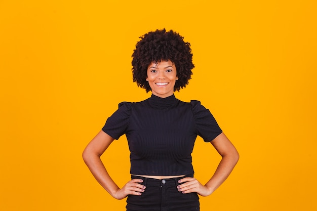 Afro woman with blackpower hair smiling. afro woman