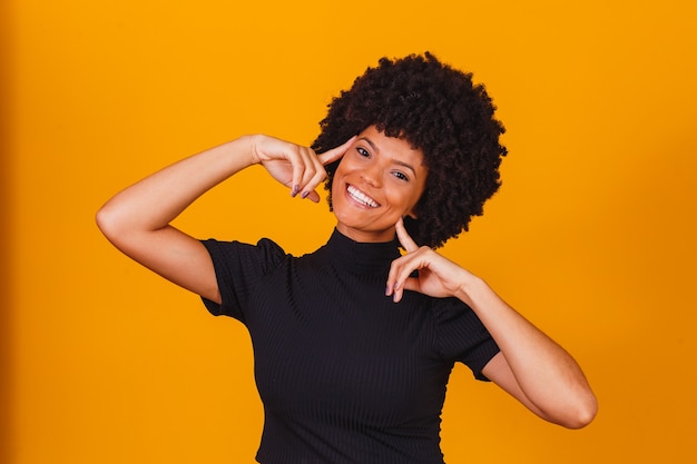 Afro woman with blackpower hair smiling. afro woman