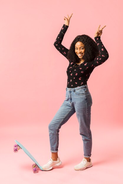 Afroamerican lady showing peace signs