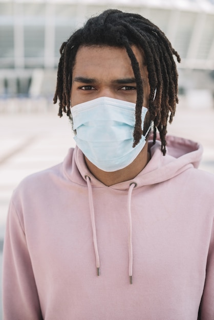 Afroamerican model wearing medical mask