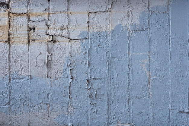 Free photo aged brick wall with paint