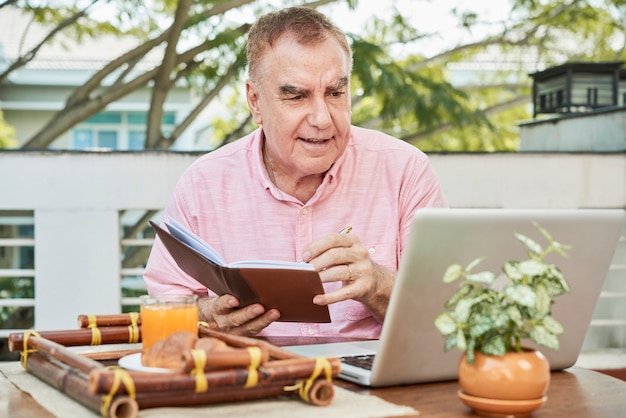 Free photo aged man watching lection