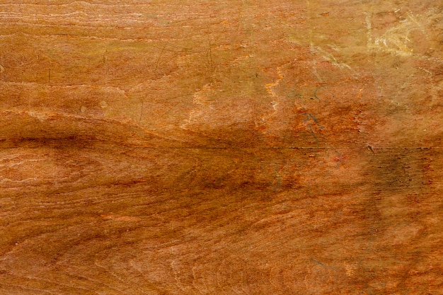 Free photo aged and scratched wood surface