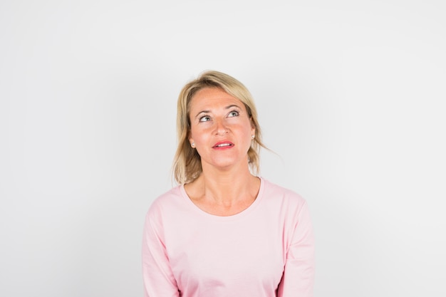 Free photo aged woman in rose blouse