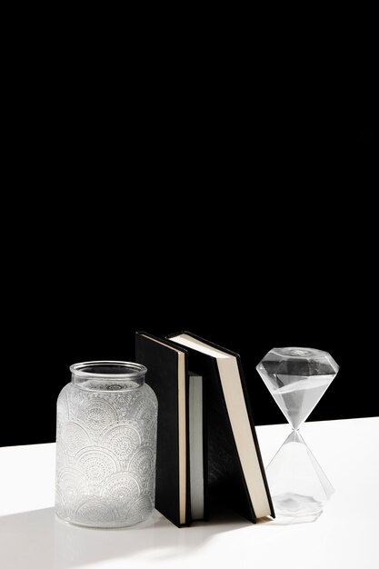 Agenda and hourglass with copy space