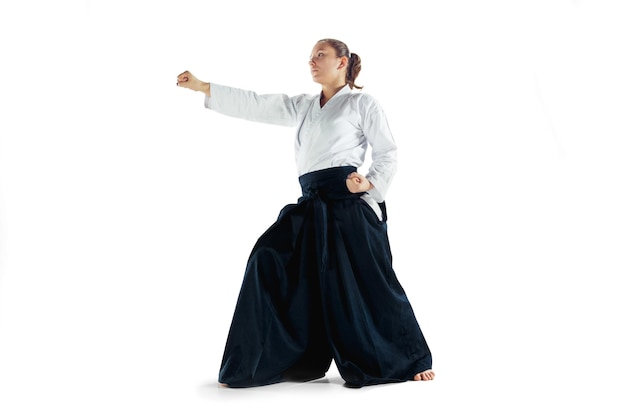 Aikido master practices defense posture.